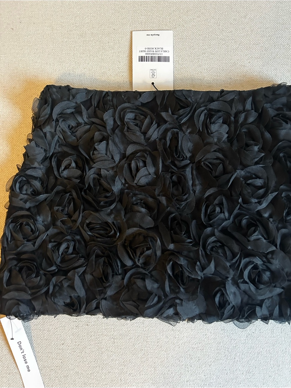 NWT • Reformation Carla low waist skirt in black rose - size 0